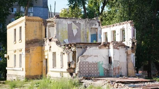 Президент подписал закон об освобождении владельцев разрушенного жилья от коммуналки