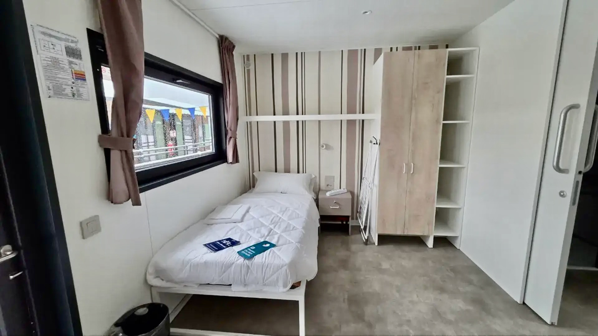 Комнаты спортсменов в модульном городке возле Кортины