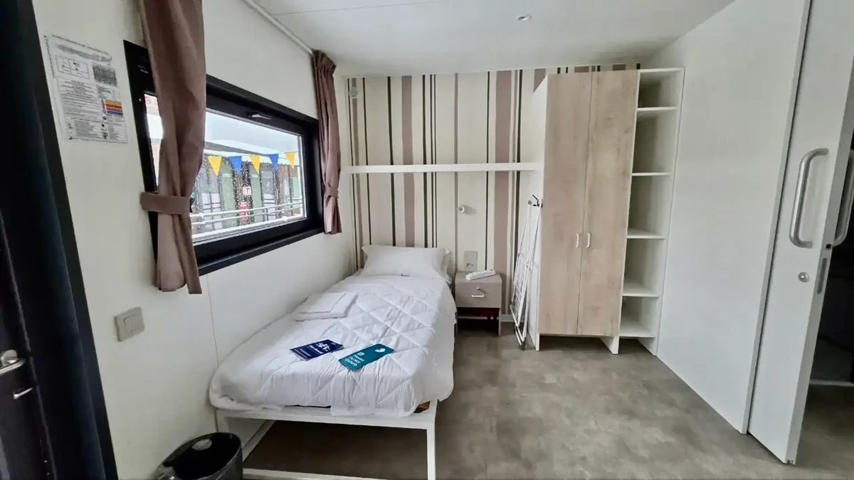 Кімнати спортсменів у модульному містечку біля Кортіни